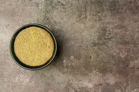 Pepper Powder from a flat lay angle with a dramatic dark background. Stock Photos