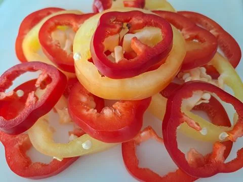 Pepper sliced into circles Stock Photos