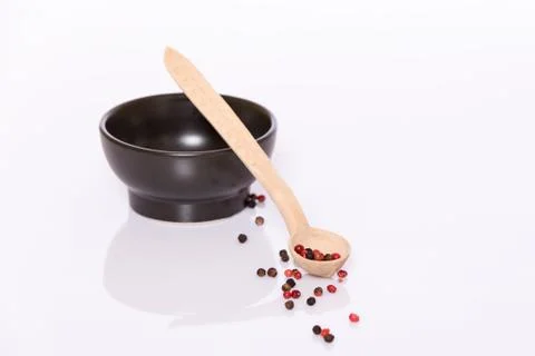 Pepper in spoon Stock Photos
