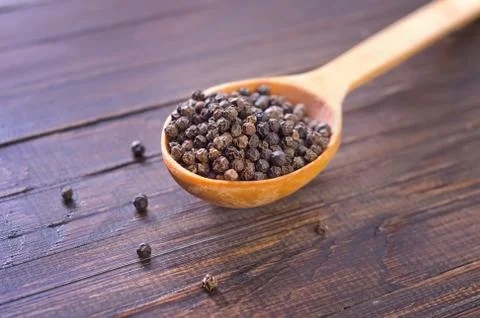 Pepper in spoon Stock Photos