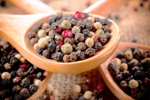 Pepper in spoon Stock Photos