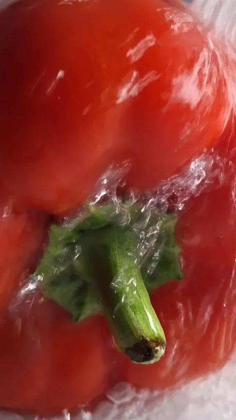 Pepper under a stream of water Stock Footage 341676650
