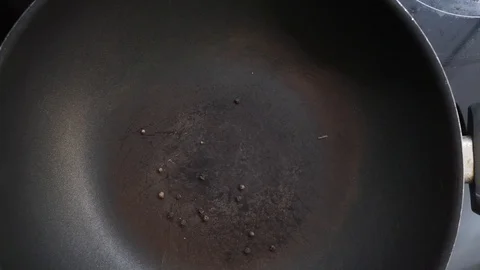 Pepper into wok Stock Footage 97410596
