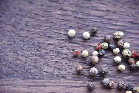 Pepper on the wooden deck Stock Photos