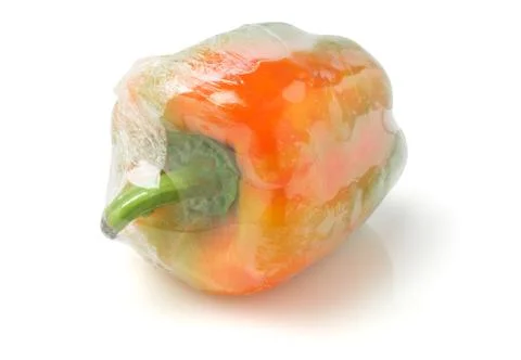 Pepper wrapped in cellophane Stock Photos