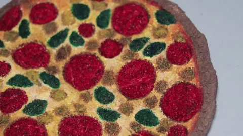Pepperoni and basil pizza made of textile. Stock Footage 337500367
