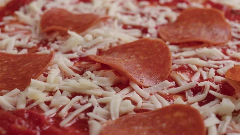 Pepperoni and Mozzarella Cheese Pizza Stock Footage 213569357