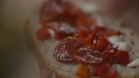 Pepperoni being placed onto sandwich from overhead view Stock Footage 194478474