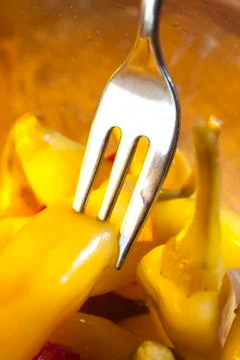 Pepperoni with glittering fork2 Stock Photos