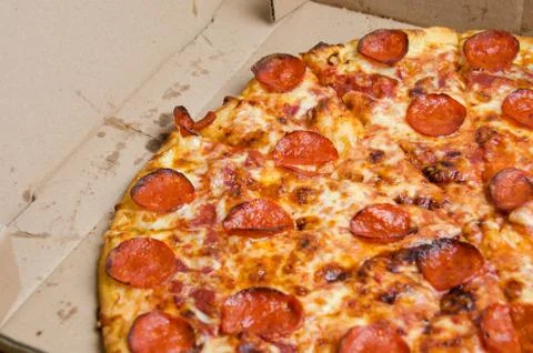 Pepperoni pizza in a box Stock Photos