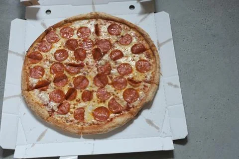 Pepperoni Pizza in Delivery Box Stock Photos
