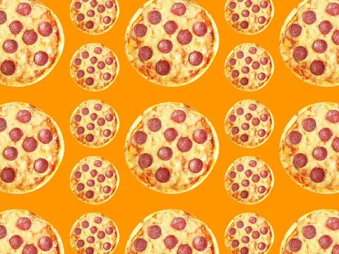 Pepperoni pizza pattern design on orange background Stockfoto's