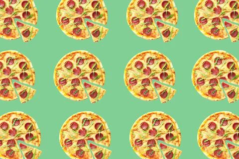 Pepperoni pizza pattern design on pale green background Stock Photos