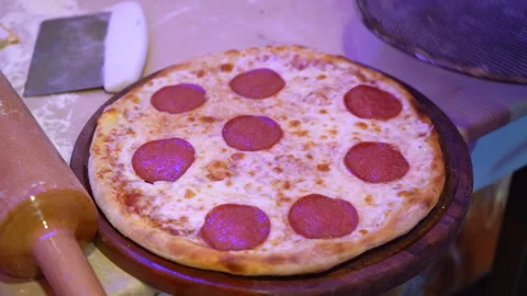 Pepperoni Pizza Preparation on Table Stock Footage 268719715