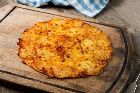 Pepperoni pizza with rustic background Stock Photos