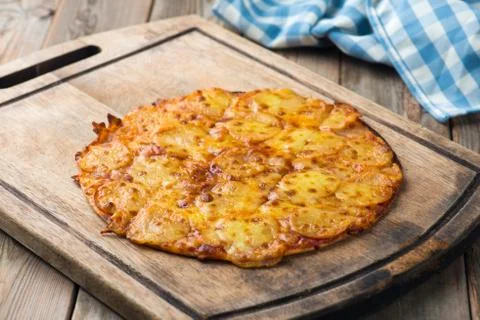 Pepperoni pizza with rustic background Stock Photos