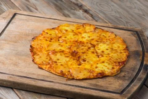 Pepperoni pizza with rustic background Stock Photos