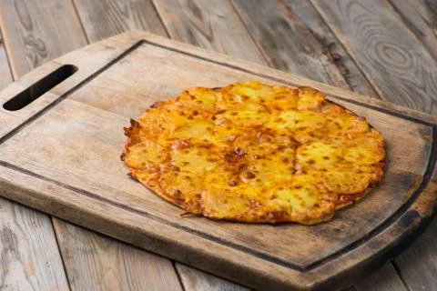 Pepperoni pizza with rustic background Stock Photos