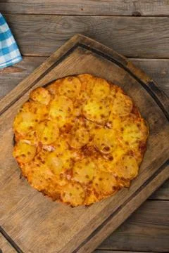 Pepperoni pizza with rustic background top down view Stock Photos