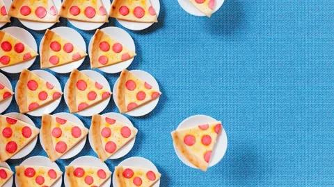 Pepperoni pizza slices with mozarella on thin crust on a plates. Take away Stock Footage 202281435