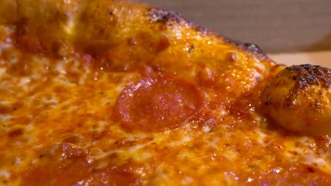 A Pepperoni pizza on the table Stock Footage 71836719