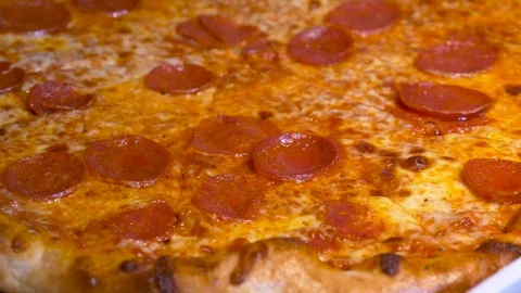 A Pepperoni pizza on the table Stock Footage 71836744