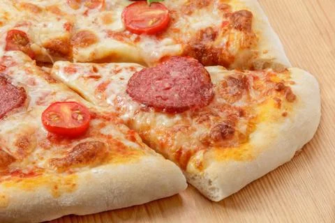 Pepperoni pizza on table Stock Photos