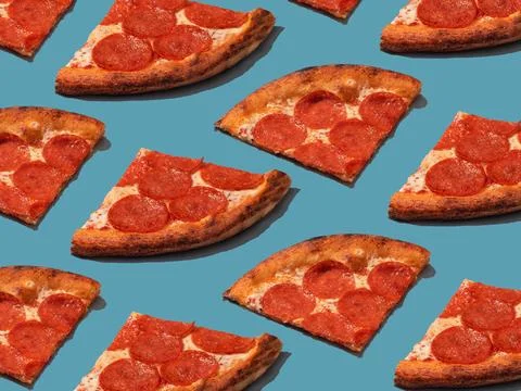 Pepperoni slice pizza pattern. Food pattern with hard shadows 스톡 사진