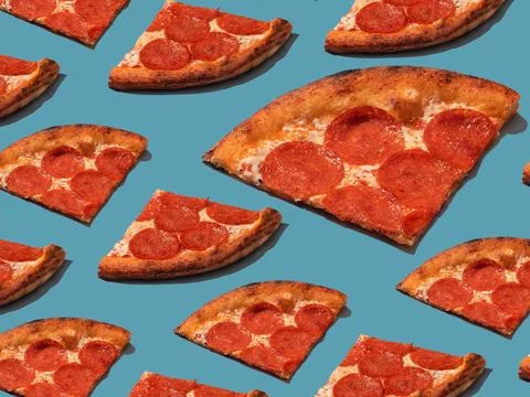 Pepperoni slice pizza pattern. Food pattern with hard shadows Stock Photos