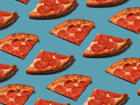 Pepperoni slice pizza pattern. Food pattern with hard shadows Stock Photos