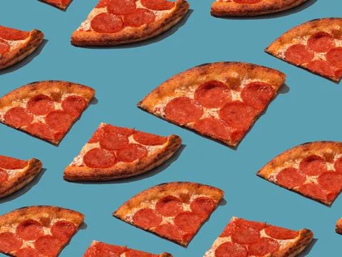 Pepperoni slice pizza pattern. Food pattern with hard shadows Foto stock