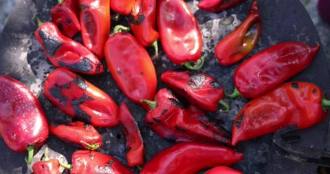 Peppers for ajvar in the process of baking. A close up view. Late summer season Stock Footage 207724015