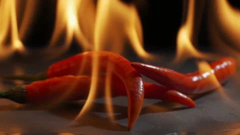Peppers and flames in slow motion Video stock 102606959