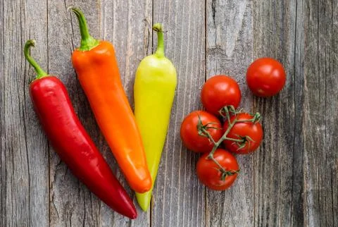 Peppers and Tomatoes on a Table Stock Photos