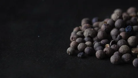 Peppers of black pepper spin on a board Stock Footage 121149209