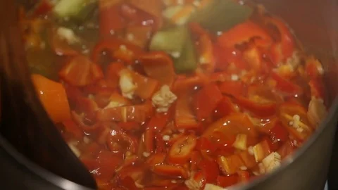Peppers Boiling in a Pot Close Up Stir Stock Footage 81276804