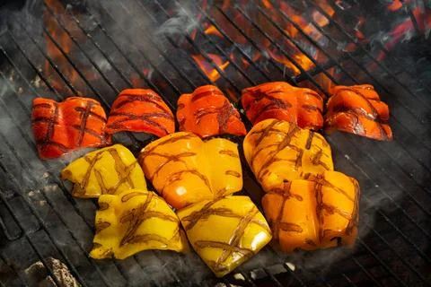 Peppers On The Flame Stock Photos