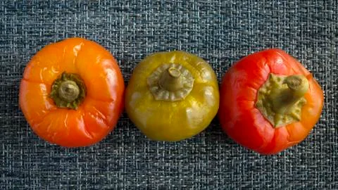 Peppers on gray background Stock-Fotos