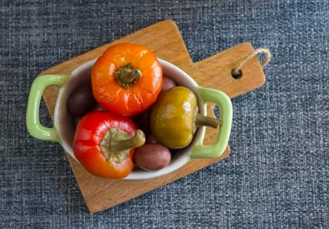 Peppers on gray background Stock Photos
