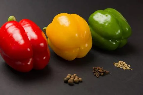 Peppers with various spices Stock Photos