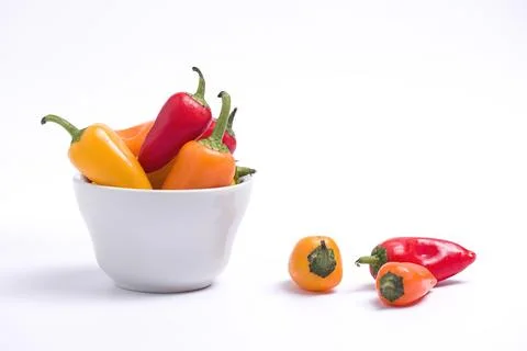 Peppers on a white background. Stock Photos