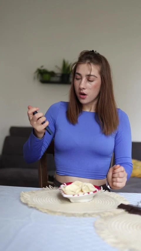 Peptide injection before enjoying favorite snacks Stock Footage 339855792