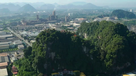 Perak Cave Temple and limestone hills aerial view, Ipoh, Malaysia Stock Footage 249042957