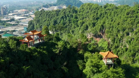 Perak Cave Temple and limestone hills aerial view, Ipoh, Malaysia Stock Footage 249132618