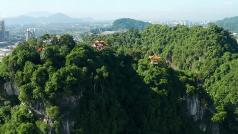 Perak Cave Temple and limestone hills aerial view, Ipoh, Malaysia Stock Footage 249132708