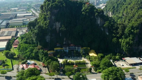 Perak Cave Temple and limestone hills aerial view, Ipoh, Malaysia Stock Footage 249230871