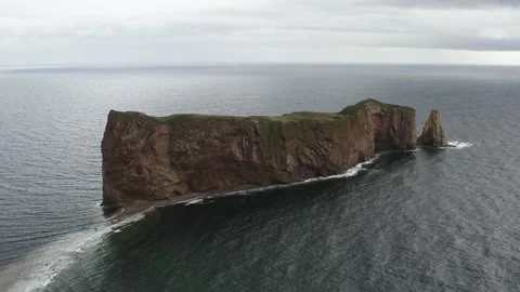 Perce Rock in the ocean aerial Stock Footage 201904349