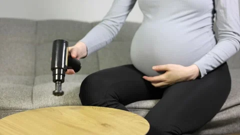Percussion massage gun Stock Footage 334804128