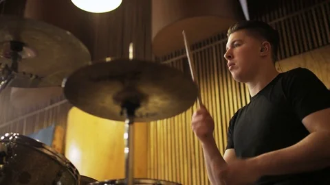 Percussionist Playing a Drum Set Seen From the Side Stock Footage 72191603