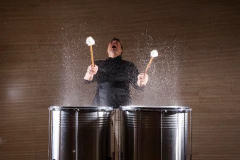 Percussionist practicing with two drums Stock Photos
